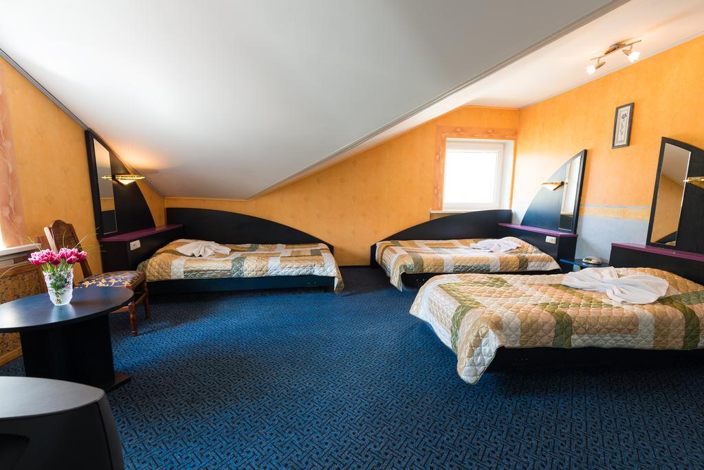Hotel Runmis Вилнюс Стая снимка